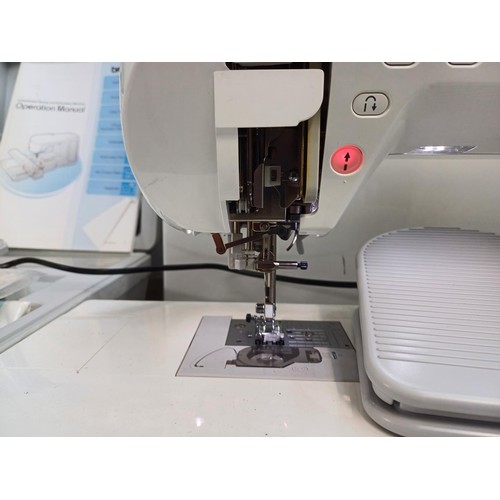 786 - A cased Brother Innov-is 4000D Disney Edition computerised sewing and embroidery machine with foot p... 