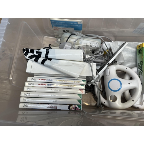 776 - A box containing Nintendo Wii console with games and accessories