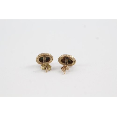 2010 - A pair of 9ct gold abalone shell stud earrings with scroll backs - approx. gross weight 1.9g