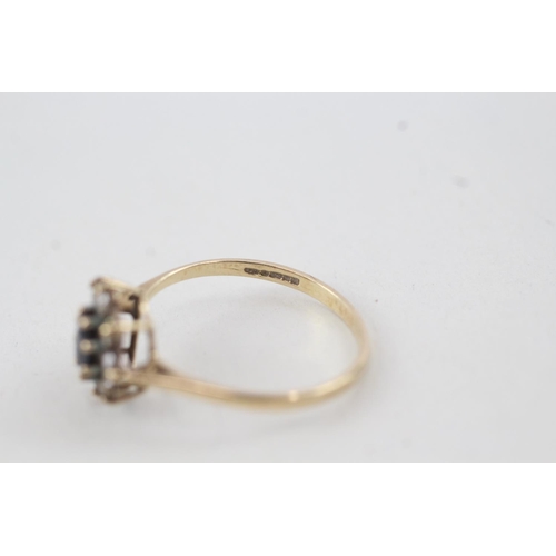 2015 - A 9ct gold sapphire and cubic zirconia cluster ring - approx. gross weight 1.4g