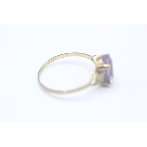 2035 - A 9ct gold amethyst single stone ring - approx. gross weight 1.6g