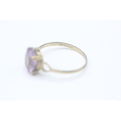 2035 - A 9ct gold amethyst single stone ring - approx. gross weight 1.6g