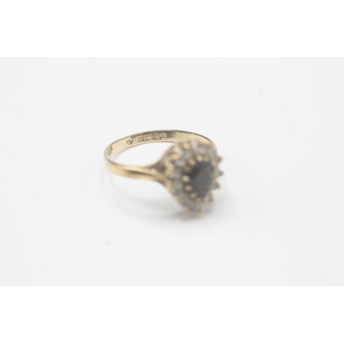 2037 - A 9ct gold sapphire and cubic zirconia cluster ring - approx. gross weight 1.7g