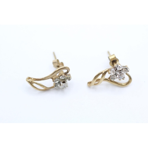 2049 - A pair of 9ct gold cubic zirconia floral cluster drop earrings - approx. gross weight 1.3g