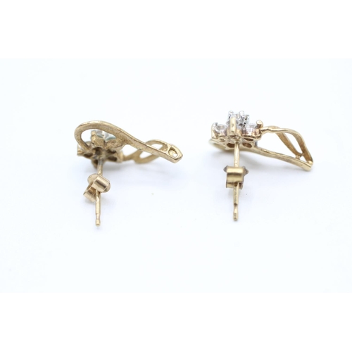 2049 - A pair of 9ct gold cubic zirconia floral cluster drop earrings - approx. gross weight 1.3g