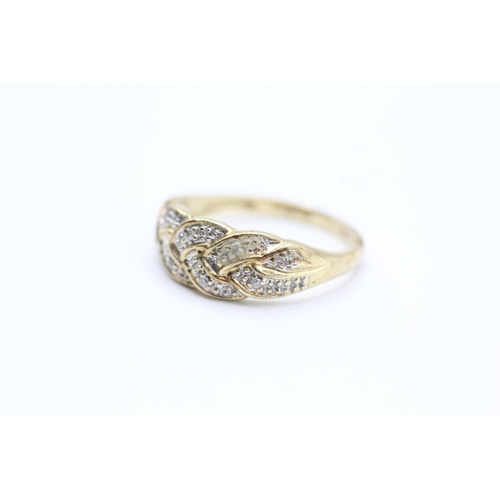 2062 - A 9ct gold diamond dress ring - approx. gross weight 2.4g