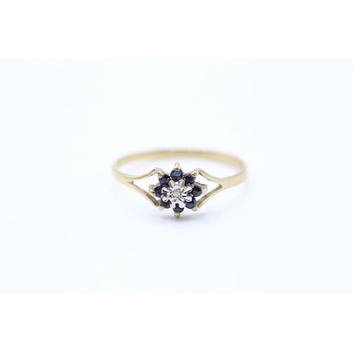 2065 - A 9ct gold diamond and sapphire floral cluster ring - approx. gross weight 0.9g