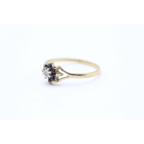 2065 - A 9ct gold diamond and sapphire floral cluster ring - approx. gross weight 0.9g