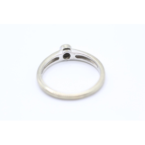 2066 - A 9ct white gold bezel set diamond single stone ring - approx. gross weight 2.4g