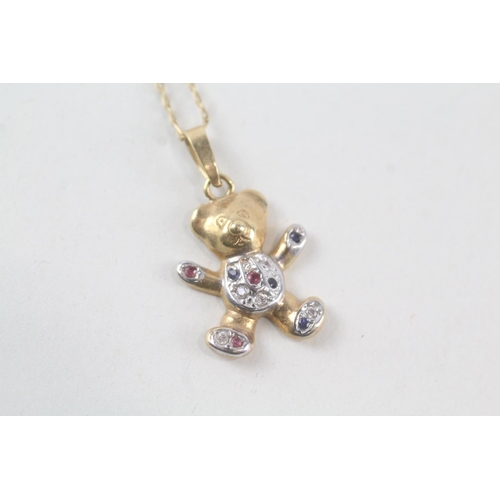 2077 - A 9ct gold bear pendant necklace set with ruby, sapphire and cubic zirconia - approx. gross weight 2... 