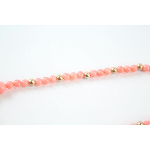 2079 - A coral single strand necklace with 9ct gold spacers and clasp - approx. gross weight 14.6g