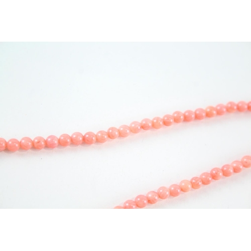 2079 - A coral single strand necklace with 9ct gold spacers and clasp - approx. gross weight 14.6g