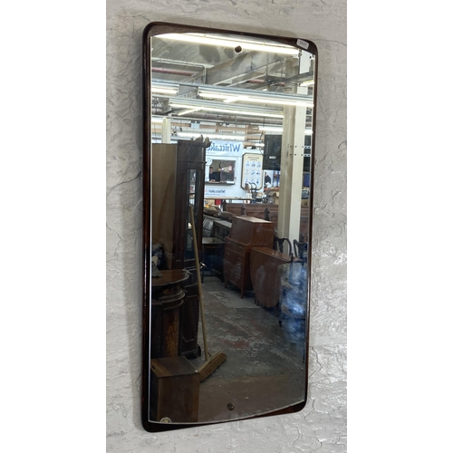 252 - A mid 20th century teak framed wall mirror - approx. 77cm high x 36cm wide