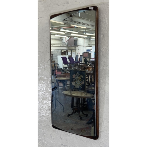 252 - A mid 20th century teak framed wall mirror - approx. 77cm high x 36cm wide