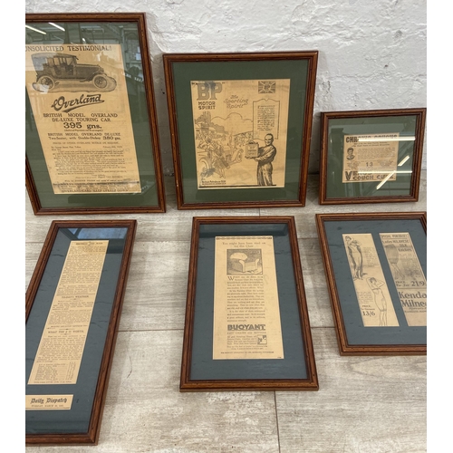 254 - Six early 20th century framed newspaper advertising clippings - largest approx. 39cm high x 27cm wid... 