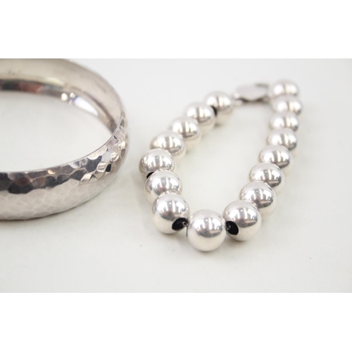 2082 - Three .925 silver bracelets - approx. gross weight 92g