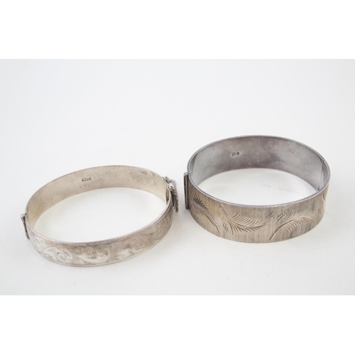 2090 - Two hallmarked sterling silver bangles - approx. gross weight 75g