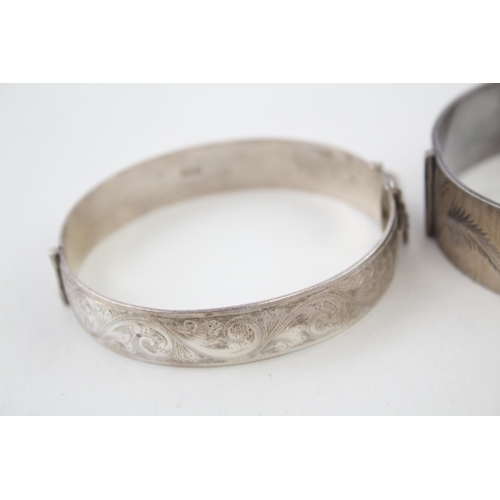 2090 - Two hallmarked sterling silver bangles - approx. gross weight 75g