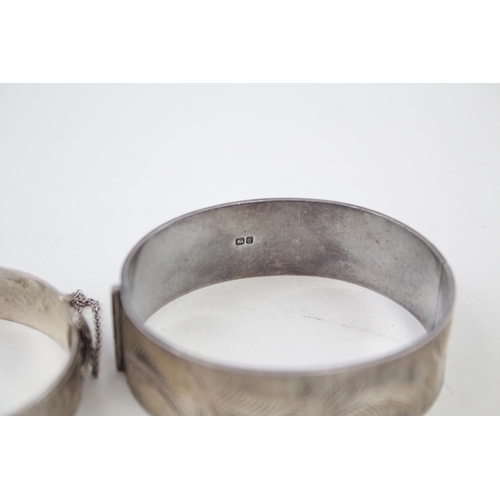 2090 - Two hallmarked sterling silver bangles - approx. gross weight 75g