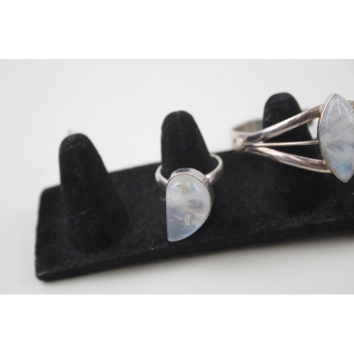 2094 - Three pieces of .925 silver moonstone set jewellery, two rings and one cuff bracelet - approx. gross... 