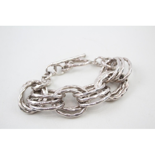 2095 - A sterling silver hammered links statement bracelet - approx. gross weight 82g