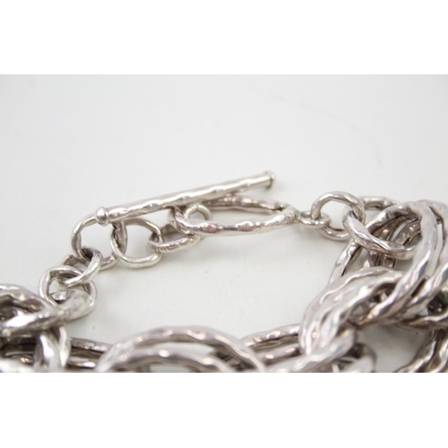 2095 - A sterling silver hammered links statement bracelet - approx. gross weight 82g