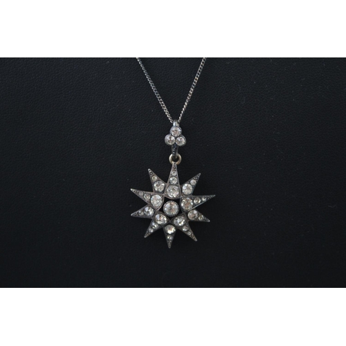 2099 - An antique sterling silver paste set star pendant necklace with box - approx. gross weight 8g