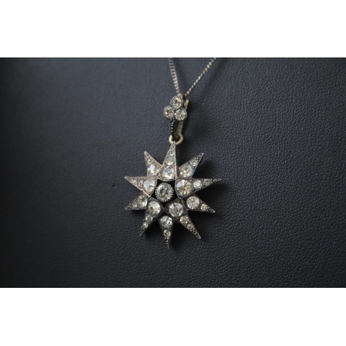 2099 - An antique sterling silver paste set star pendant necklace with box - approx. gross weight 8g