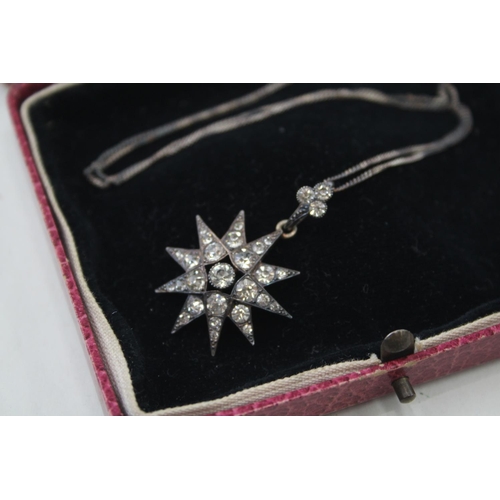 2099 - An antique sterling silver paste set star pendant necklace with box - approx. gross weight 8g