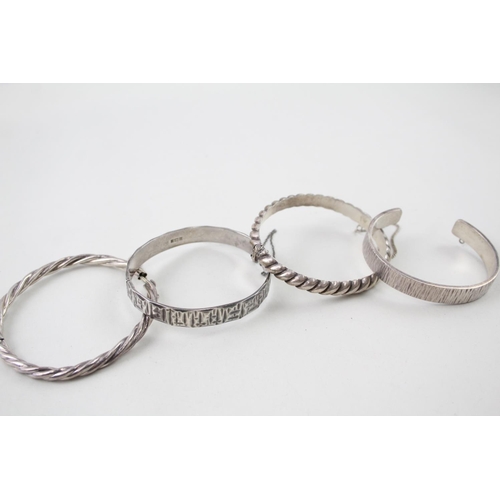 2101 - Four sterling silver bangles - approx. gross weight 80g