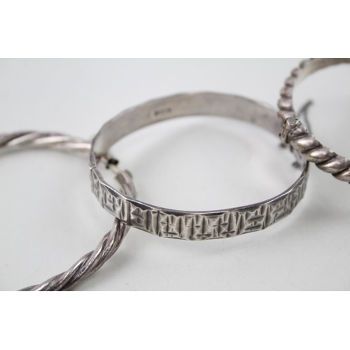 2101 - Four sterling silver bangles - approx. gross weight 80g