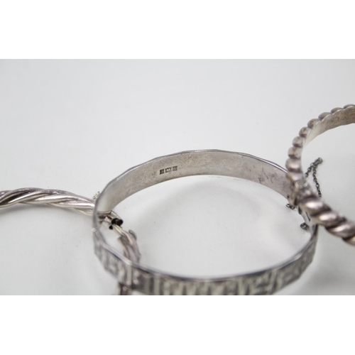 2101 - Four sterling silver bangles - approx. gross weight 80g