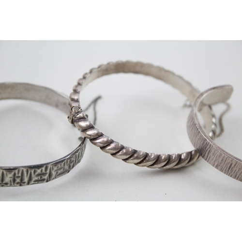 2101 - Four sterling silver bangles - approx. gross weight 80g