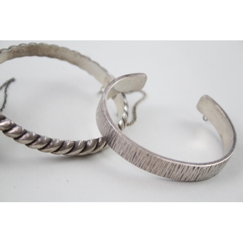 2101 - Four sterling silver bangles - approx. gross weight 80g