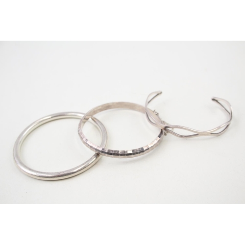 2108 - Three Minimalist sterling silver bangles - approx. gross weight 39g