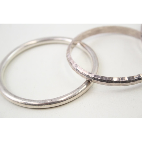 2108 - Three Minimalist sterling silver bangles - approx. gross weight 39g