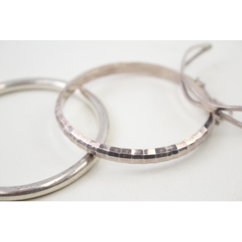 2108 - Three Minimalist sterling silver bangles - approx. gross weight 39g