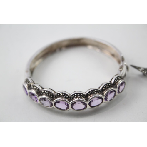 2109 - Two pieces of hallmarked sterling silver and marcasite jewellery, one amethyst set bangle and one sw... 