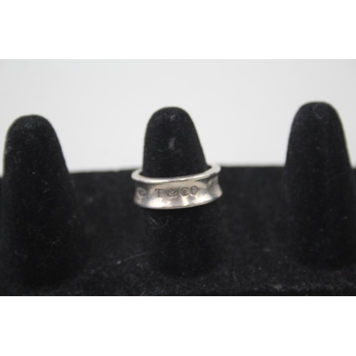 2113 - A Tiffany & Co .925 silver concave band ring, size M - approx. gross weight 5g