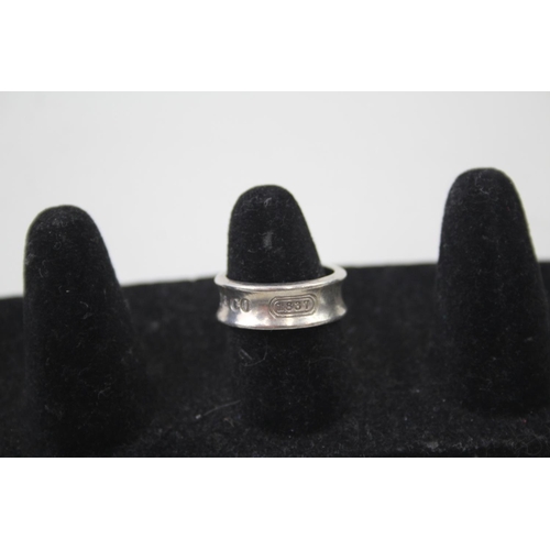 2113 - A Tiffany & Co .925 silver concave band ring, size M - approx. gross weight 5g