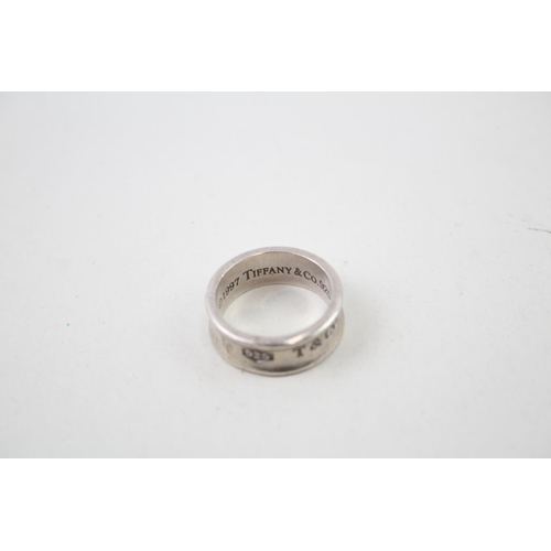 2113 - A Tiffany & Co .925 silver concave band ring, size M - approx. gross weight 5g