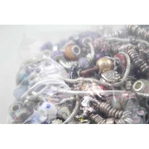 2132 - A collection of fashion charm bracelets and charms