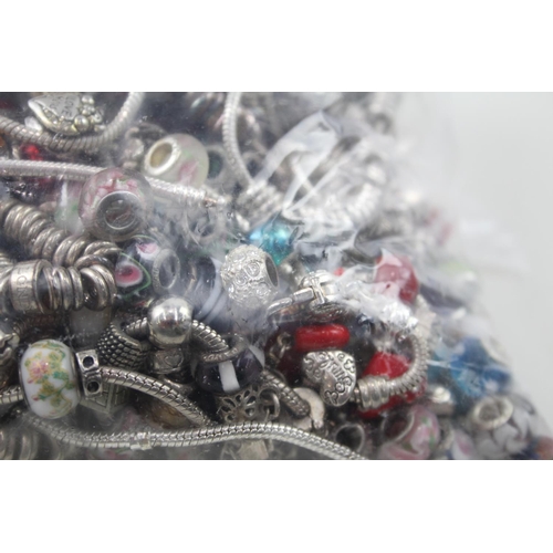 2132 - A collection of fashion charm bracelets and charms