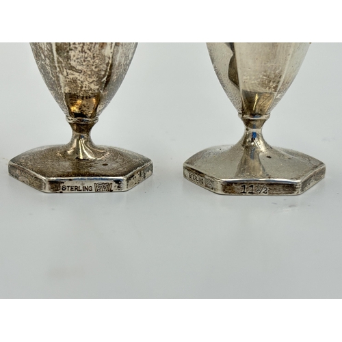 2214 - A pair of hallmarked sterling silver pepper shakers - approx. gross weight 58g