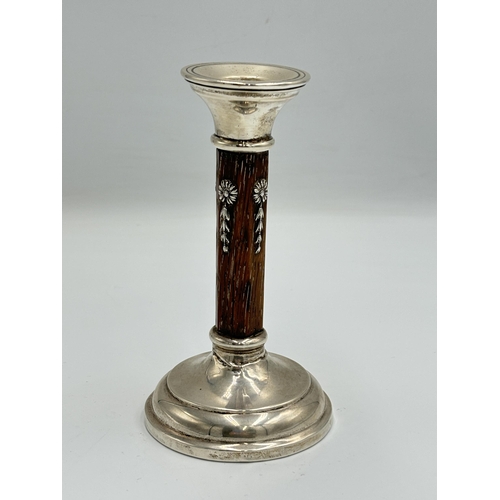 2215 - A hallmarked Birmingham silver and oak candlestick, dated 1910 - approx. 14cm high