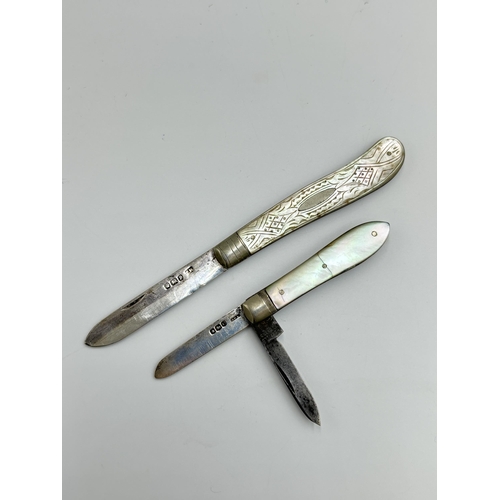 2216 - Two hallmarked Sheffield silver and mother of pearl pocket knives, one dated 1920 and one dated 1907