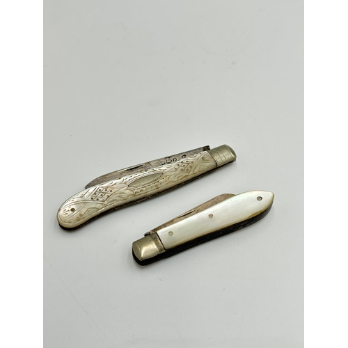 2216 - Two hallmarked Sheffield silver and mother of pearl pocket knives, one dated 1920 and one dated 1907