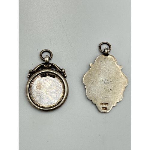 2220 - Two hallmarked Birmingham silver fobs/medallions - approx. gross weight 17.6g