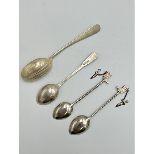 2224 - Nine hallmarked sterling silver and white metal items, two Dubai white metal souvenir spoons, three ... 