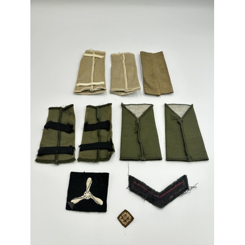 2295 - Ten military cloth patches and epaulettes to include Cheshire A.C.F. etc.